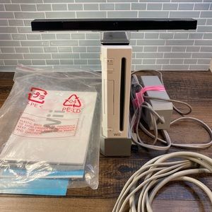 Wii console with manual and cables!